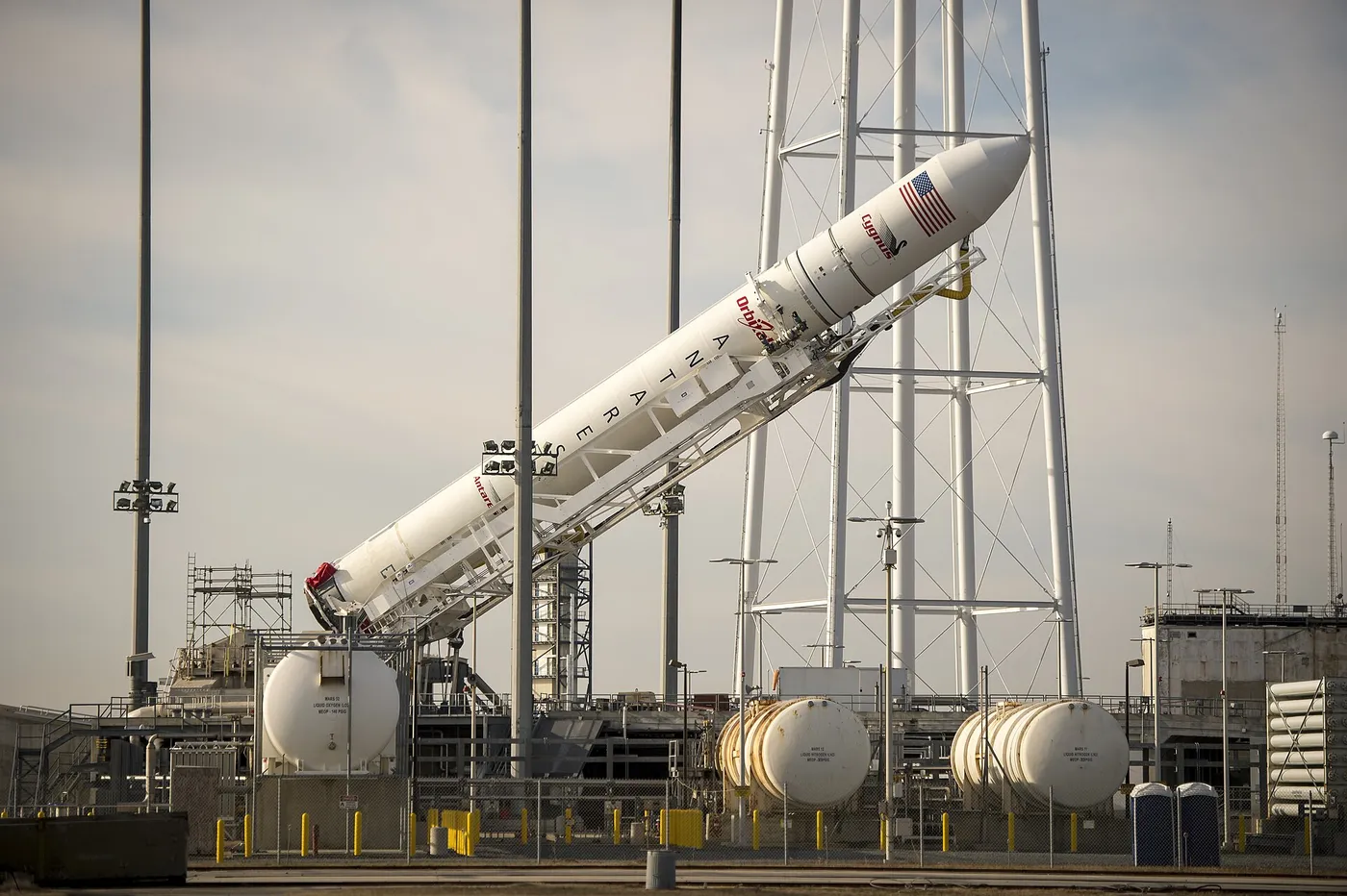 20131217 Antares CRS Orb 1 rocket being raised at MARS pad 0A