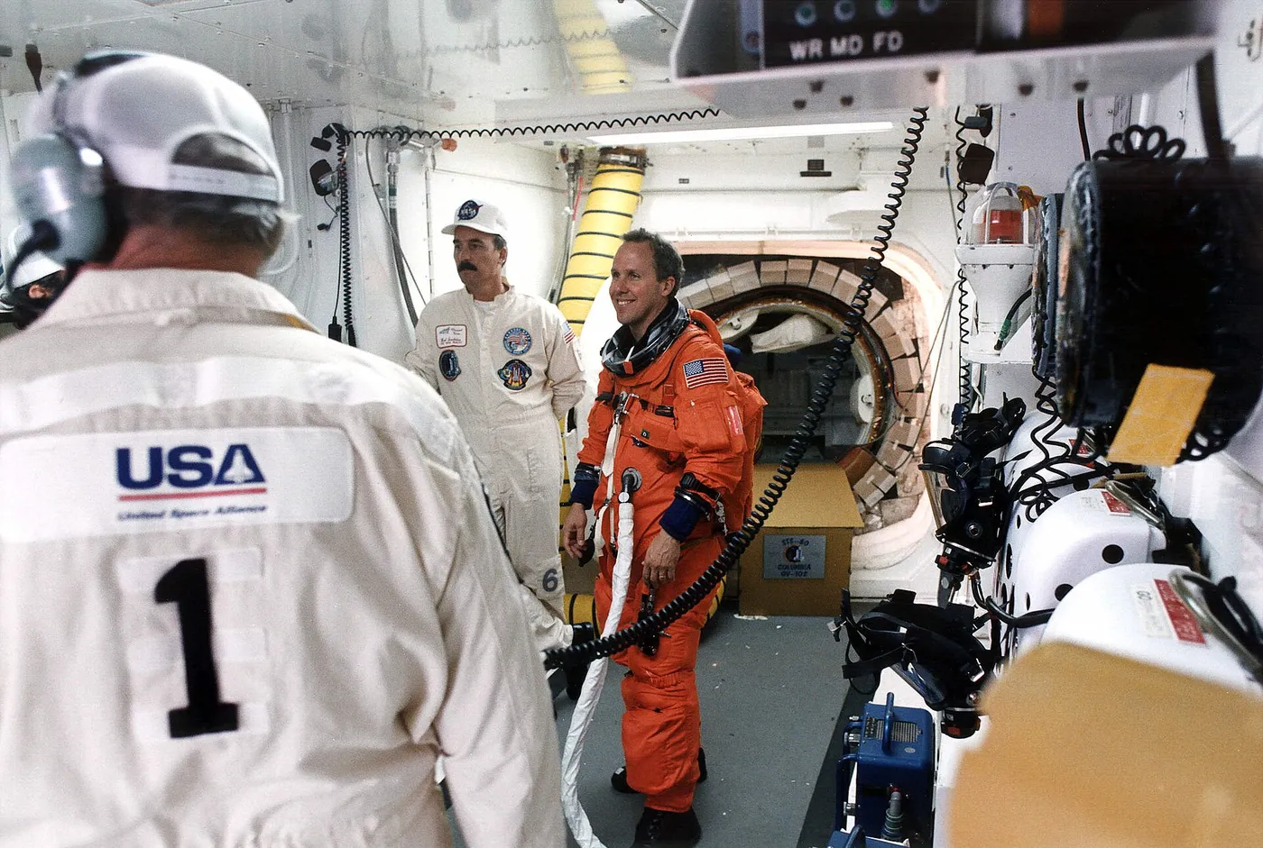 KSC 96EC 1295 NASA Mission Specialist Thomas Jones in White Room prior to launch of Space Shuttle mission STS 80