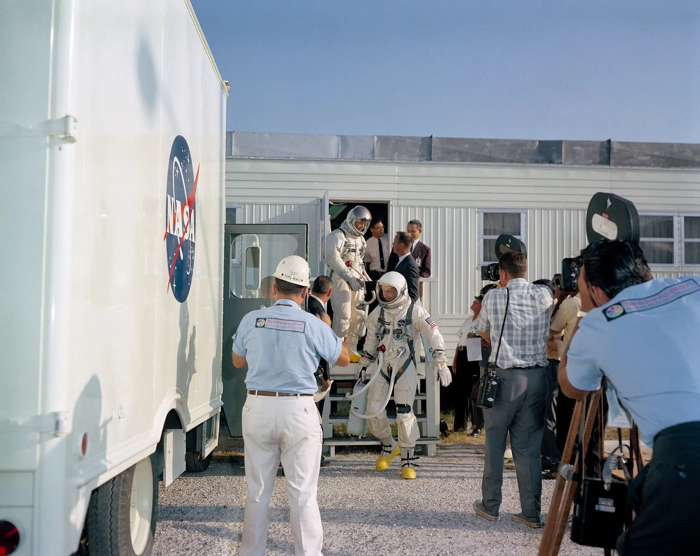 Astronaut Edward H. White is shown leaving the suiting trailer at Pad 16. CAPE KENNEDY, FL CN