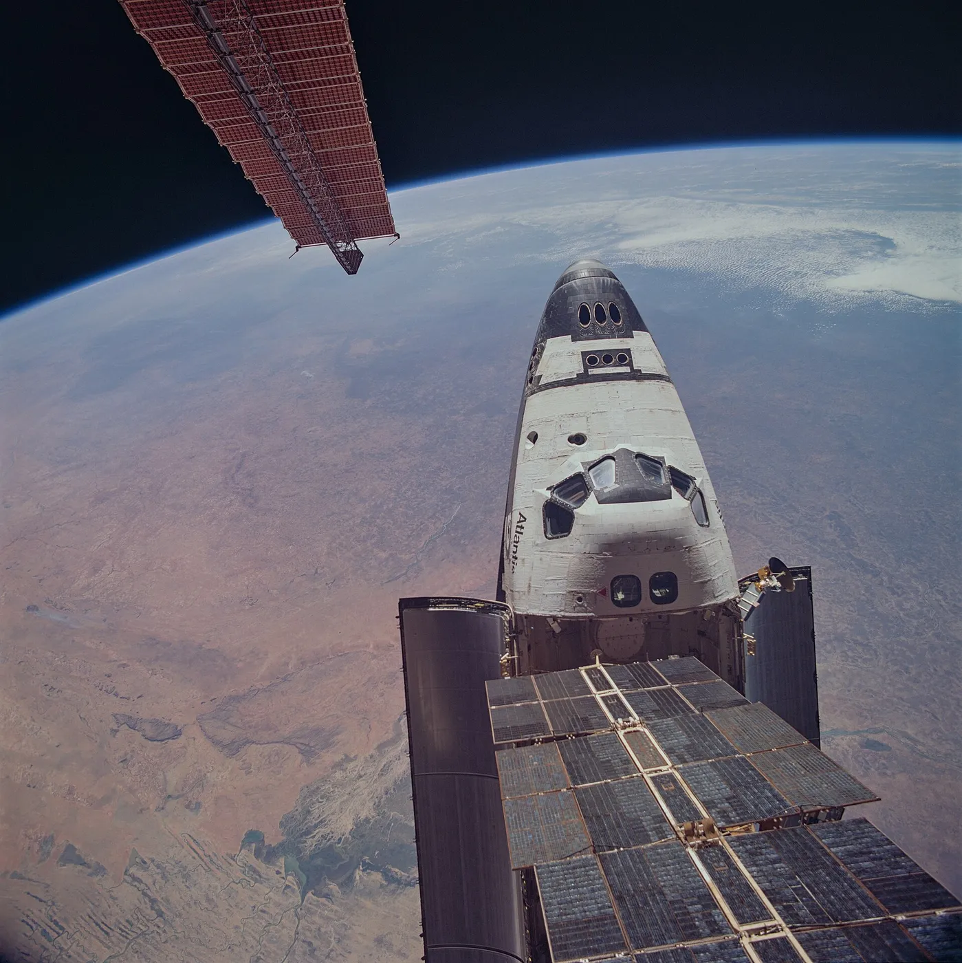 Space Shuttle Atlantis docked to the Mir space station on STS-81