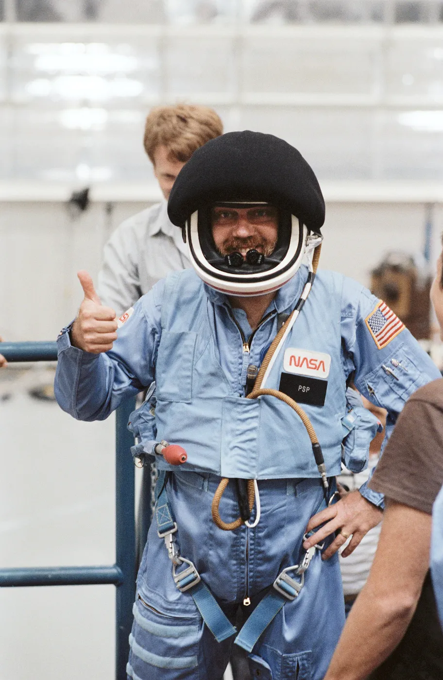 Payload Specialist Scully Power in full flight suit with helmet