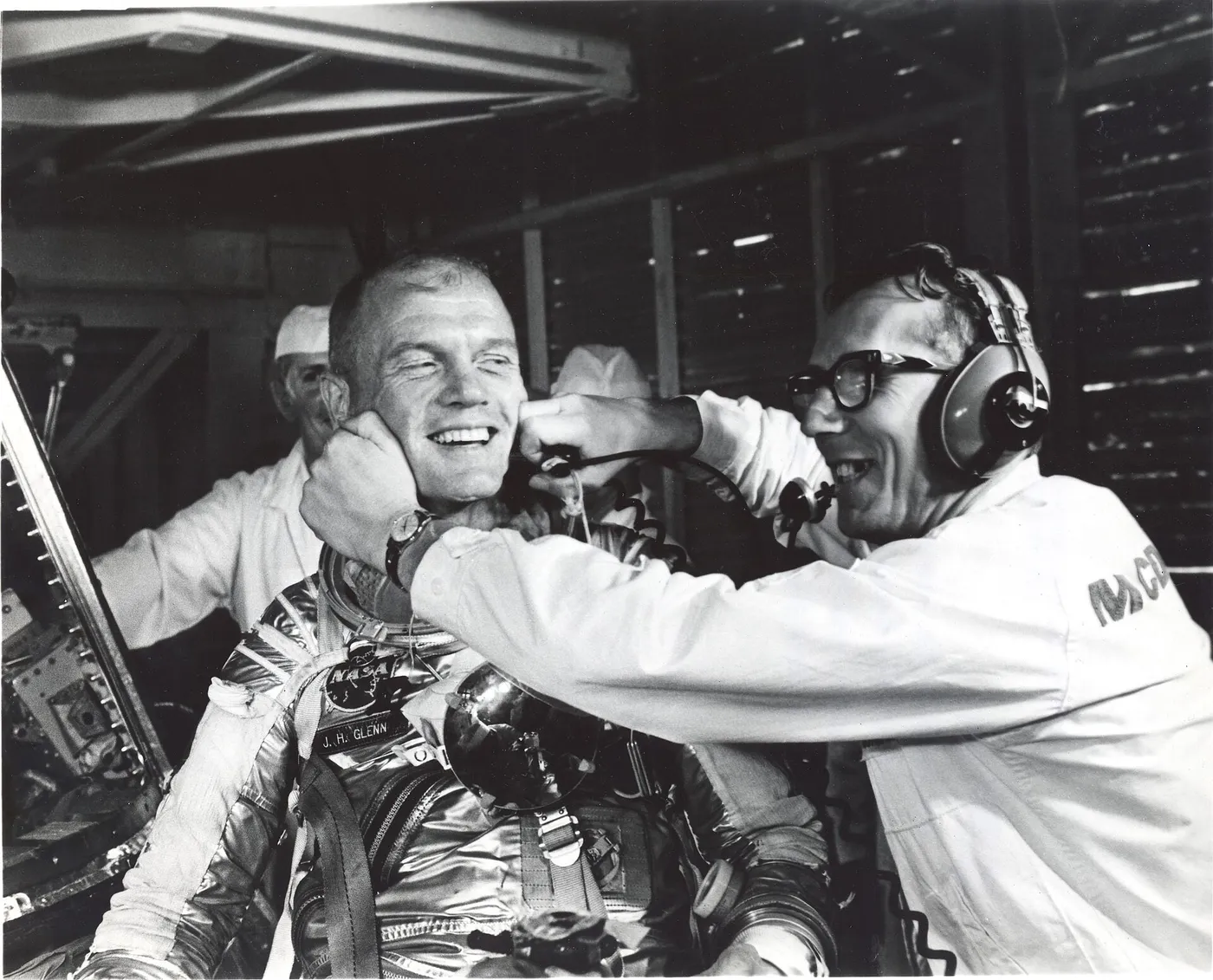 Guenter Wendt, the original pad leader for NASA's manned space program, coaxes a smile out of astronaut John Glenn after the MA-6 mission was…