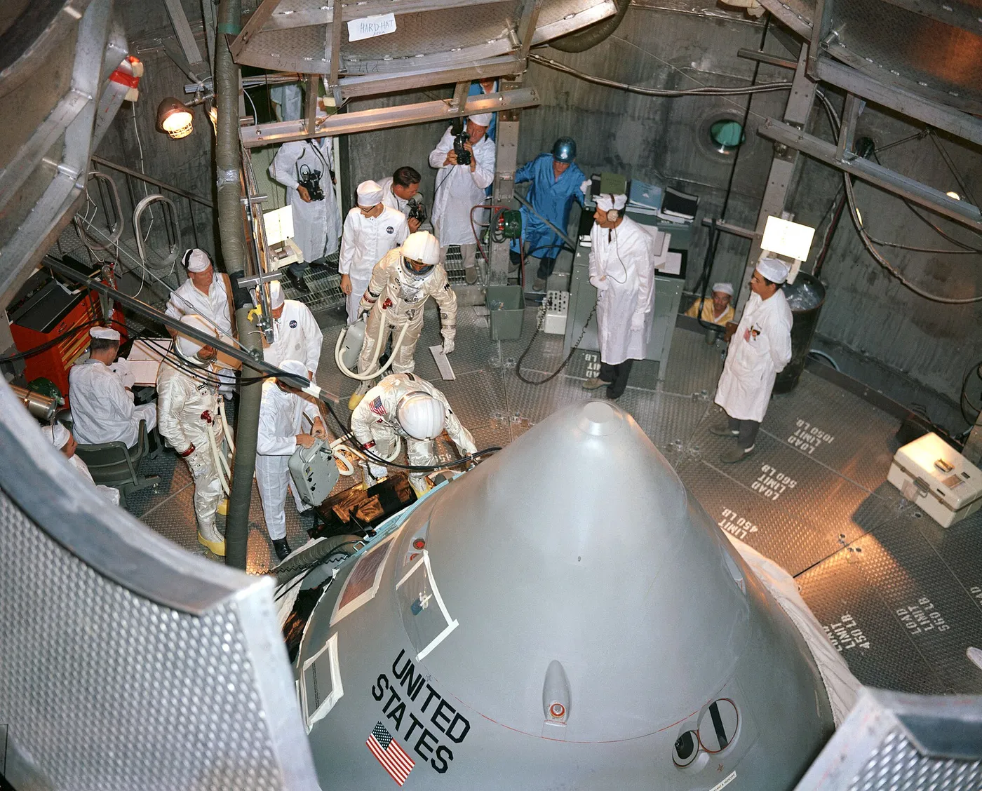 Apollo 1 crew prepare to enter their spacecraft in the altitude chamber at Kennedy Space Center
