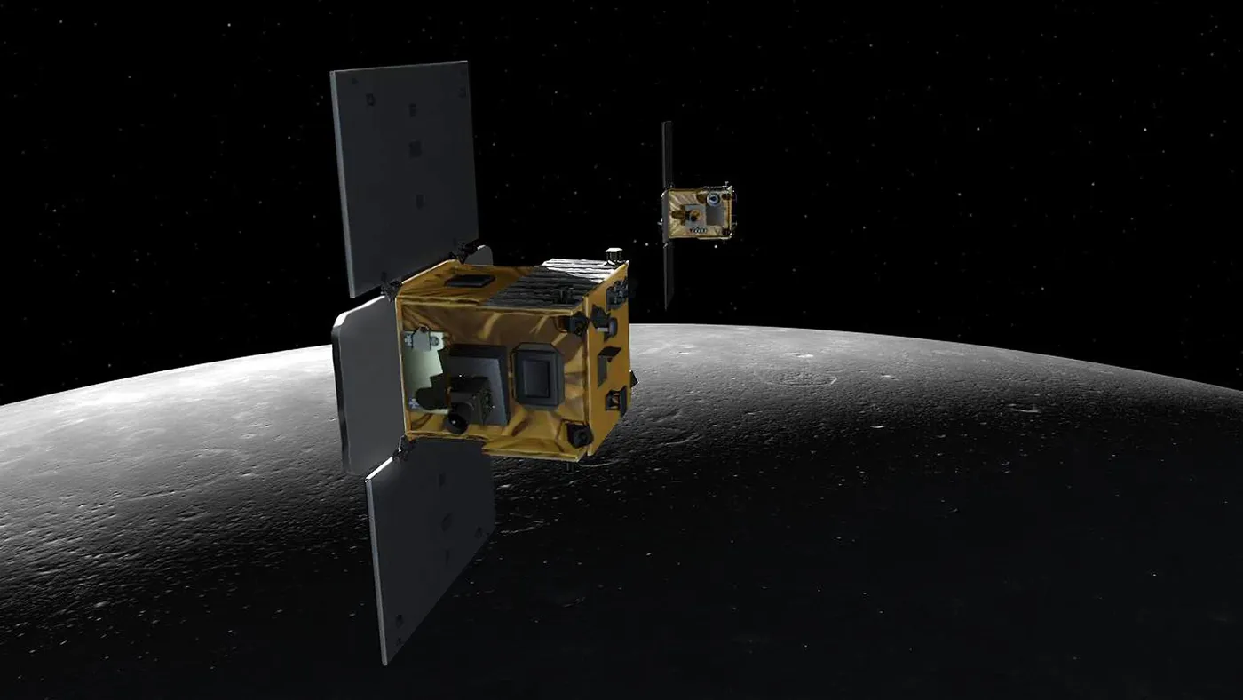 Illustration of GRAIL spacecraft over the Moon