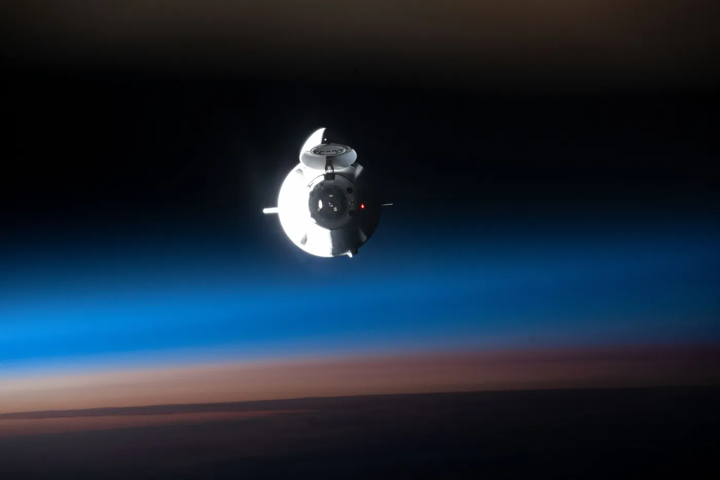 The SpaceX Dragon space freighter, on its 25th Commercial Resupply Services mission, approaches the International Space Station during an orbital…