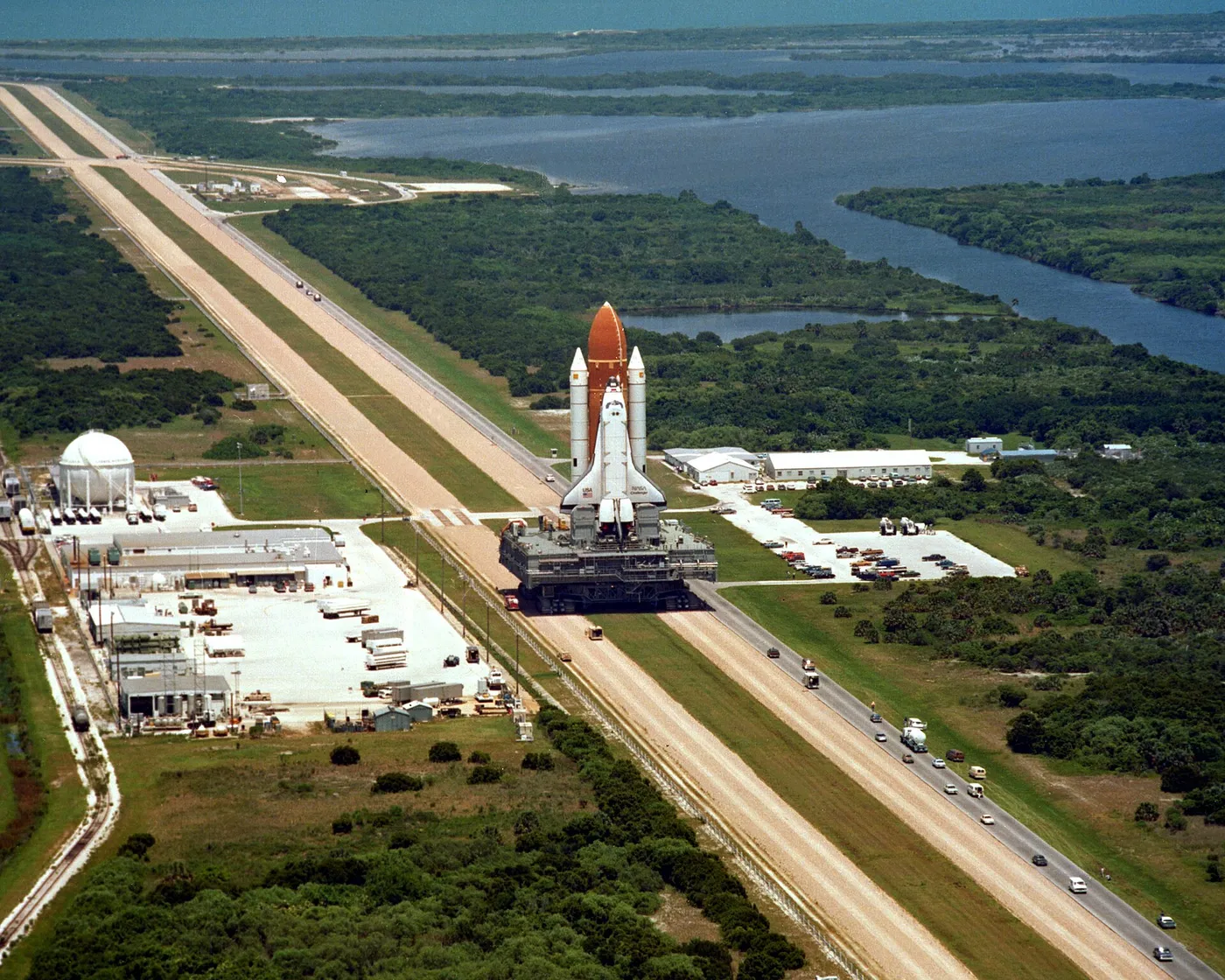 Space Shuttle Challenger is carried by a Crawler-transporter on the way to its launch pad, prior to its final flight before being destroyed in the…