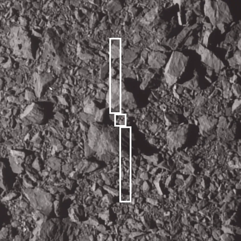 Footprint of DART spacecraft over the spot where it impacted asteroid Dimorphos. The largest boulder near the impact site is about 6.5 meters (21…