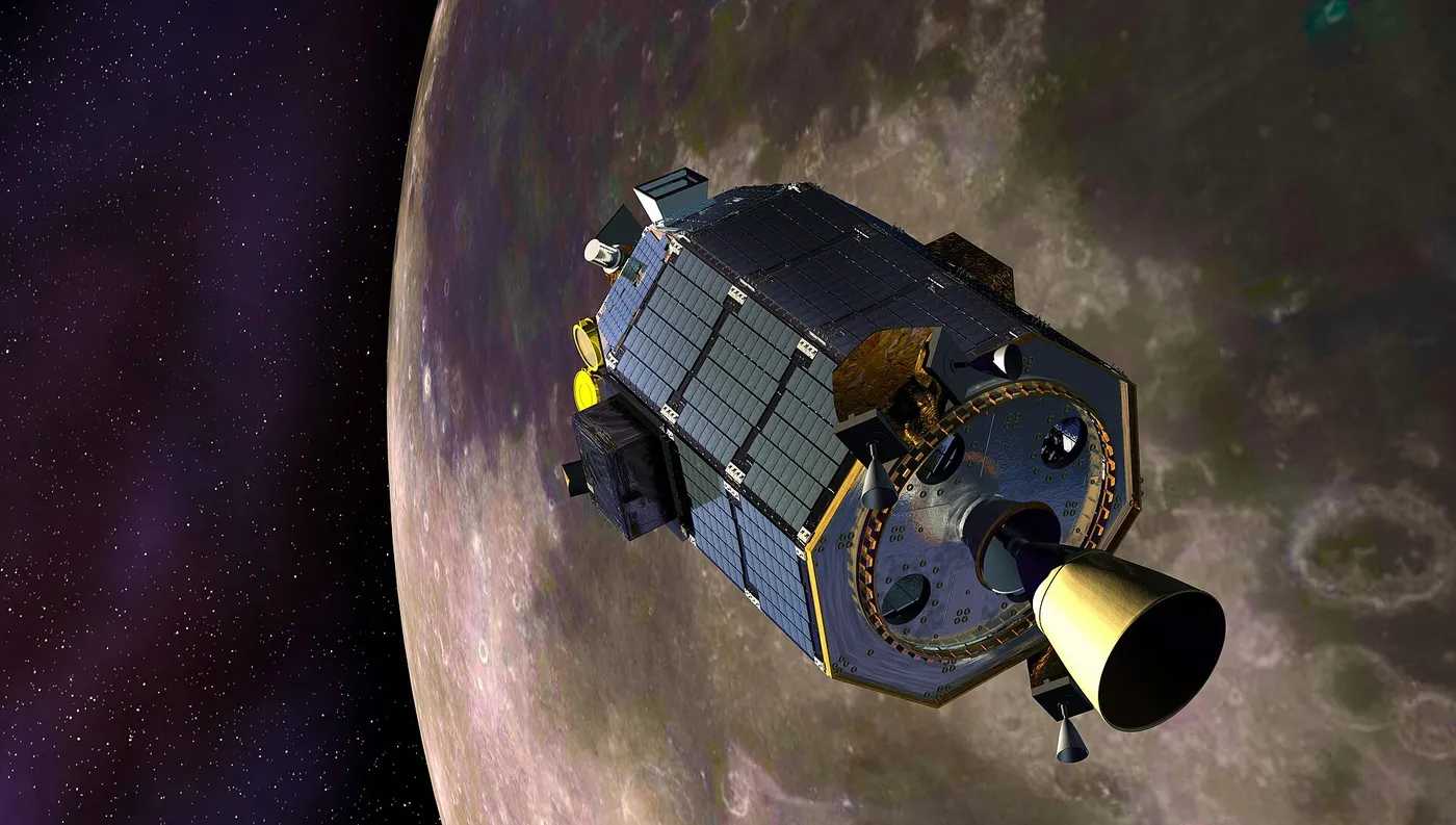An artist's concept showing the Lunar Atmosphere and Dust Environment Explorer (LADEE) spacecraft is seen orbiting the moon as it prepares to fire…