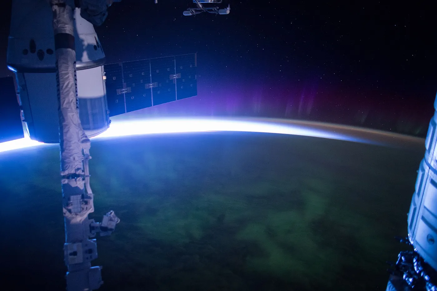 Morning breaks for astronauts and cosmonauts aboard the International Space Station. SpaceX's Dragon spacecraft sits on the left side of frame,…