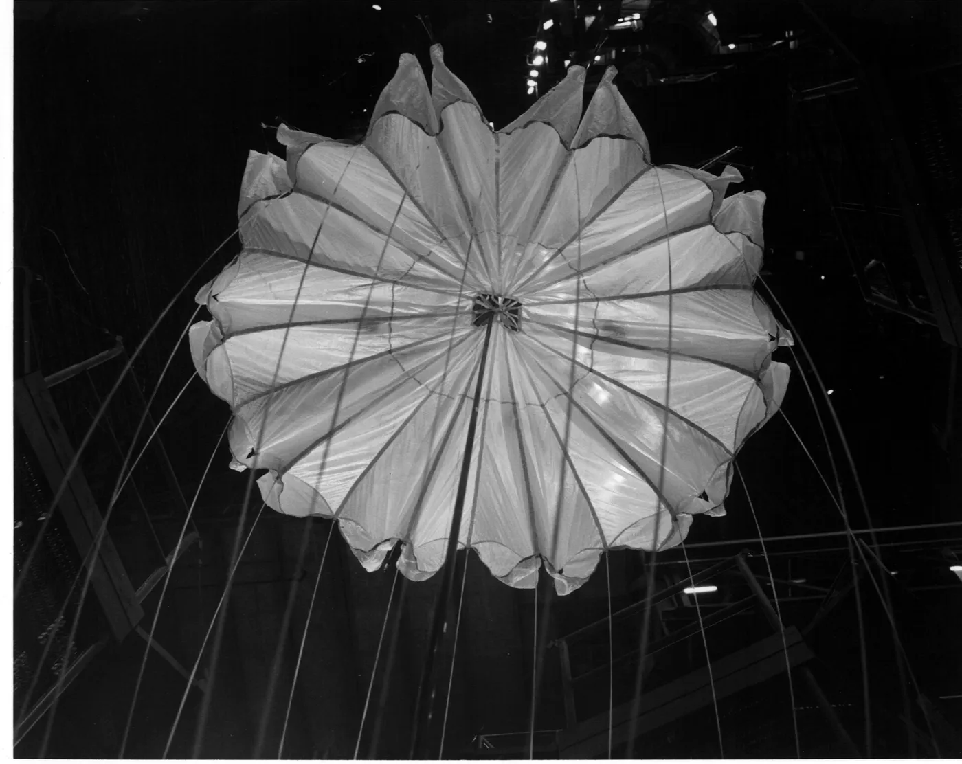 A parachute system, designed to carry an instrument-laden probe down through the dense atmosphere of torrid, cloud-shrouded Venus, was tested in…