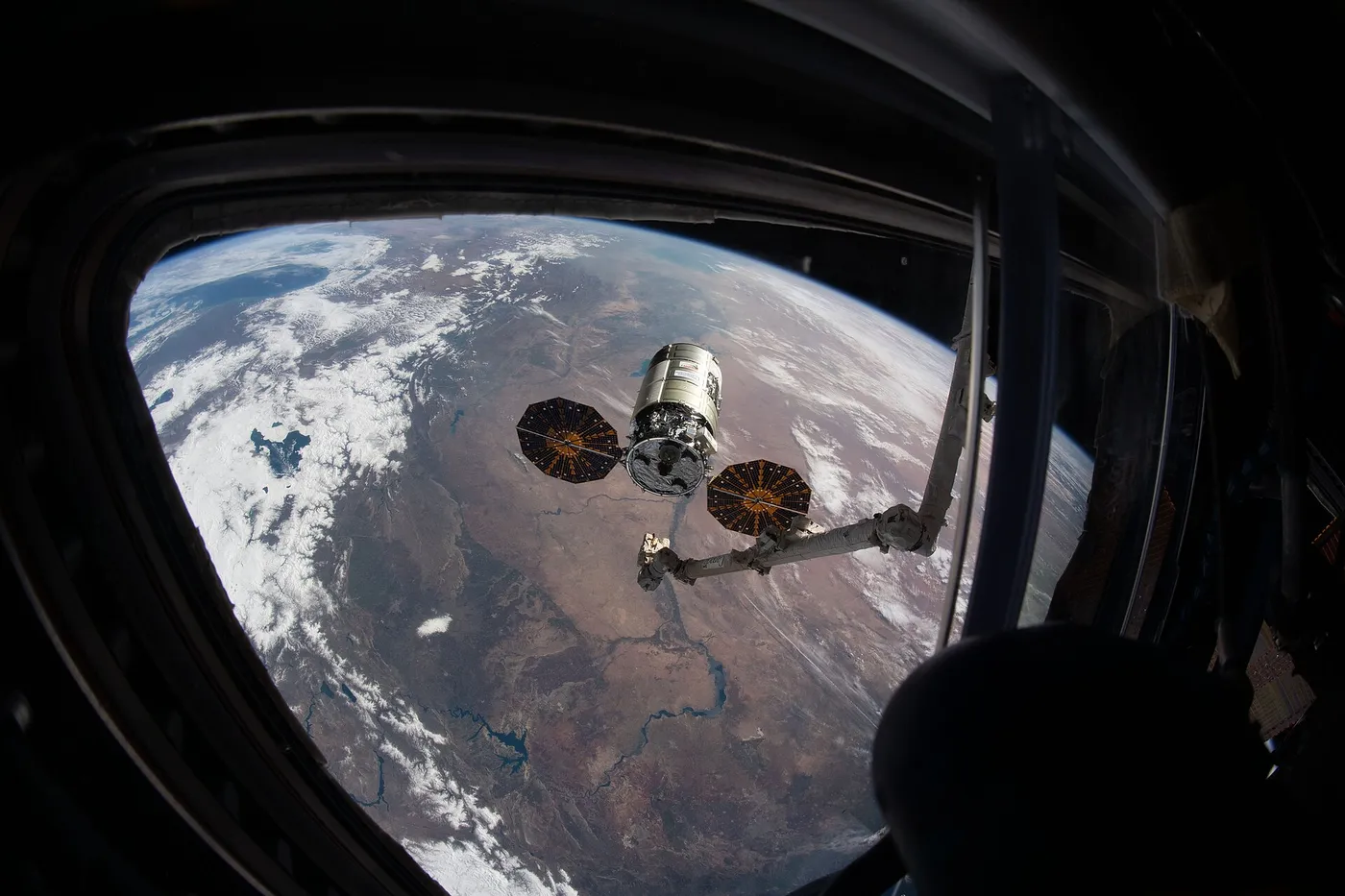 The Cygnus space freighter from Northrop Grumman is pictured moments before its capture with the Canadarm2 robotic arm.