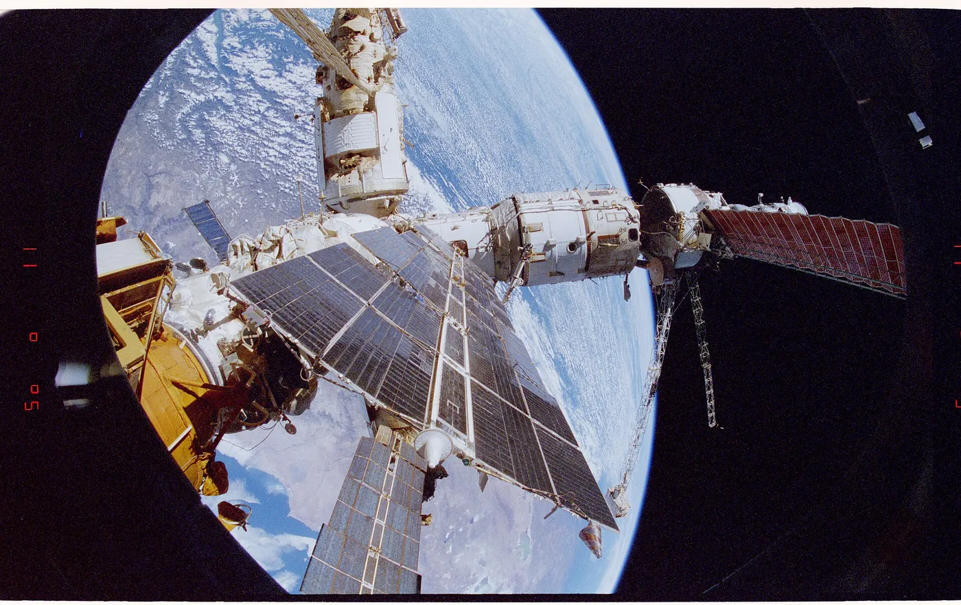 STS084 309 014 STS 084 View of Mir Space Station as seen from flight deck overhead window and Spacehab DPLA 8779511e7b072cfd8d524d7cf2e580d7