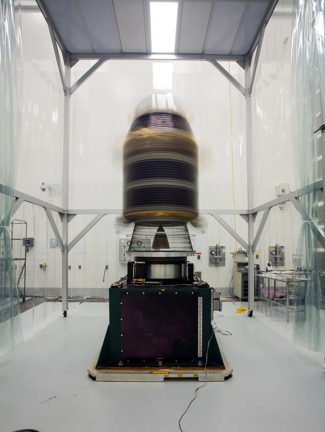 To make sure that the Lunar Atmosphere and Dust Environment (LADEE) spacecraft is perfectly balanced for flight, engineers mount it onto a spin table…