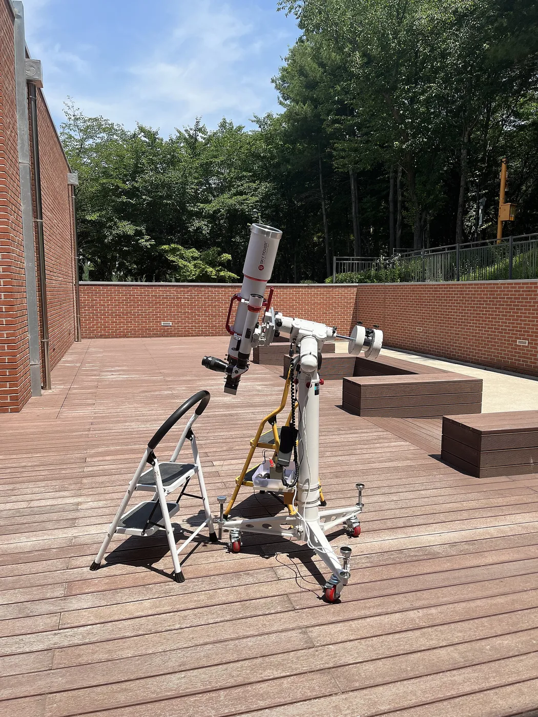 Pair of solar telescopes for observing sunspots and prominences