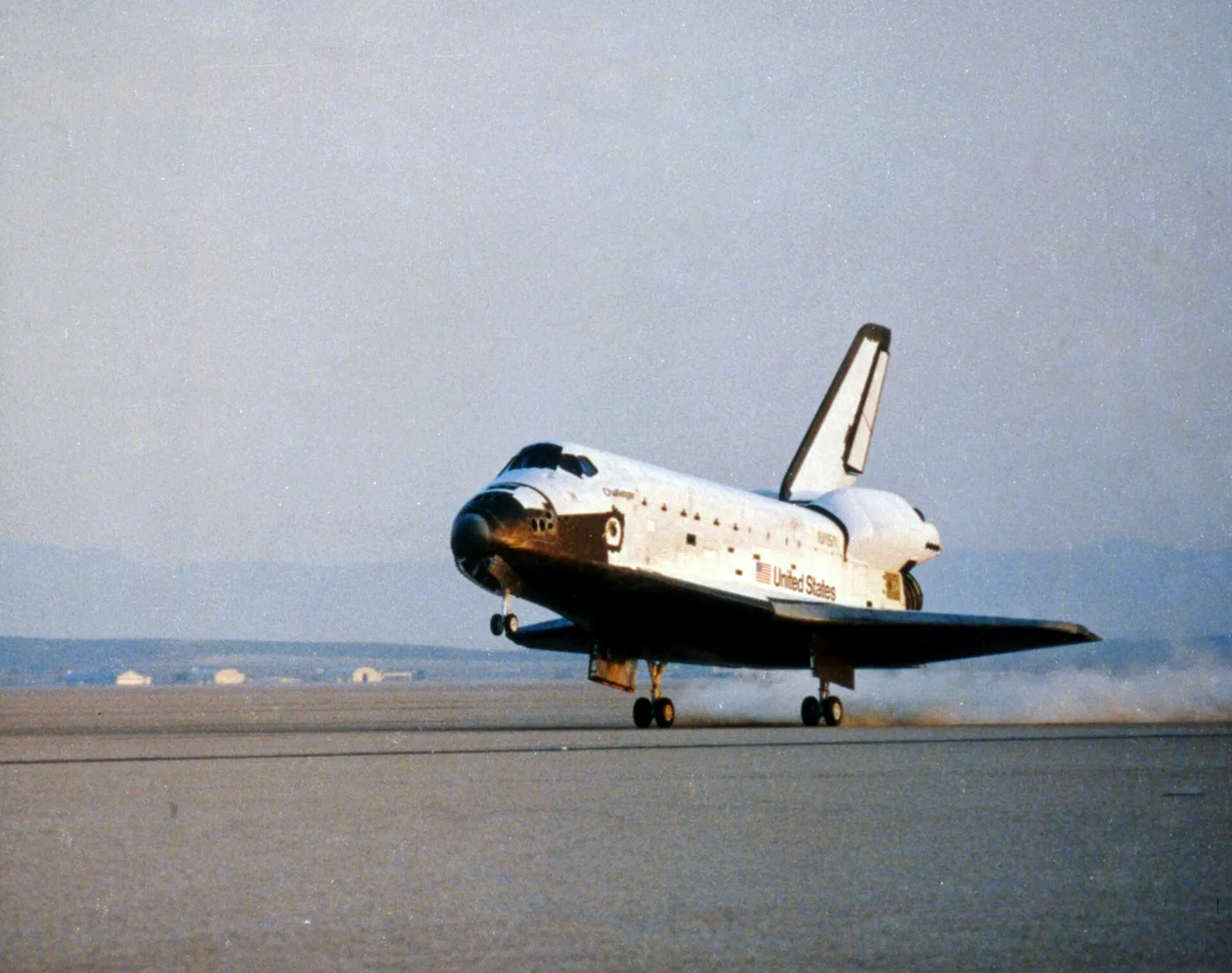 STS-41-C touches down at runway 17, Edwards Air Force Base. Sunrise was 16 minutes prior.