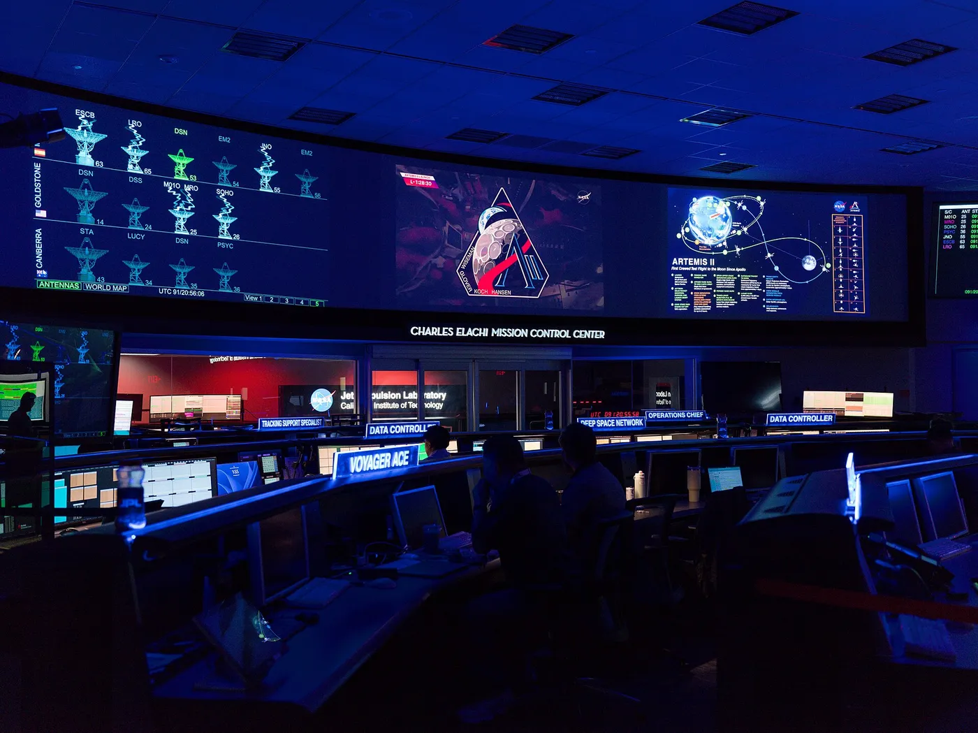 The Artemis II mission patch appears in the center screen of the Space Flight Operations Facility at NASA’s Jet Propulsion Laboratory in Southern…