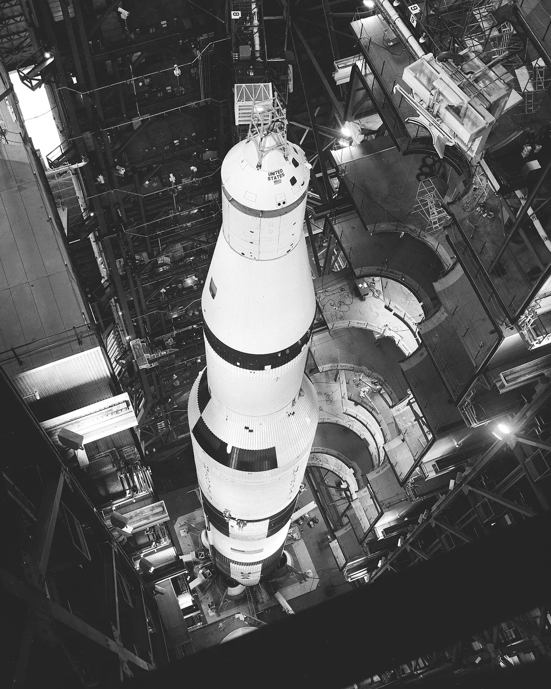 Top-to-bottom view of the 36-story-tall Saturn Apollo 501 space vehicle with work platforms retracted. VAB, High Bay No.1.