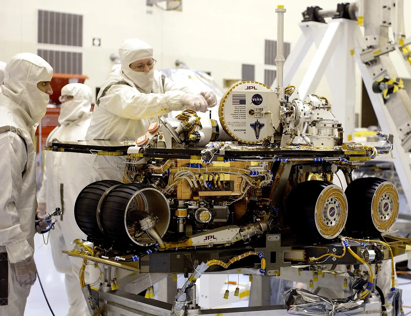 Technicians do final checks on NASA’s Spirit rover in this image from March 28, 2003