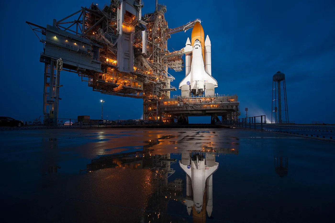 The Space Shuttle Atlantis is seen shortly after the rotating service structure (RSS) was rolled back at launch pad 39a, Thursday, July 7, 2011 at…