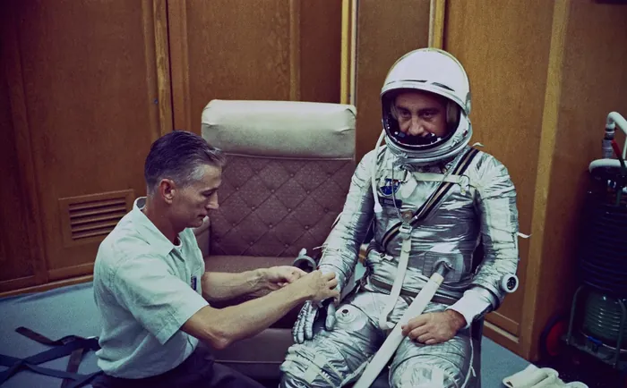 Astronaut Grissom dons spacesuit for Mercury Redstone 4 mission