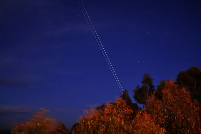 ISS and Atlantis over Australia during the final hours of