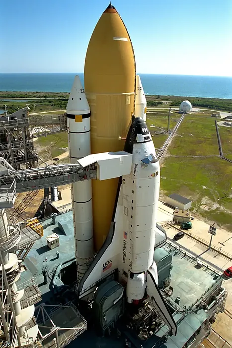 Space Shuttle Discovery sits atop a mobile launcher platform at Launch Complex 39A, Kennedy Space Center, on April 27, 1998, ready to launch for…