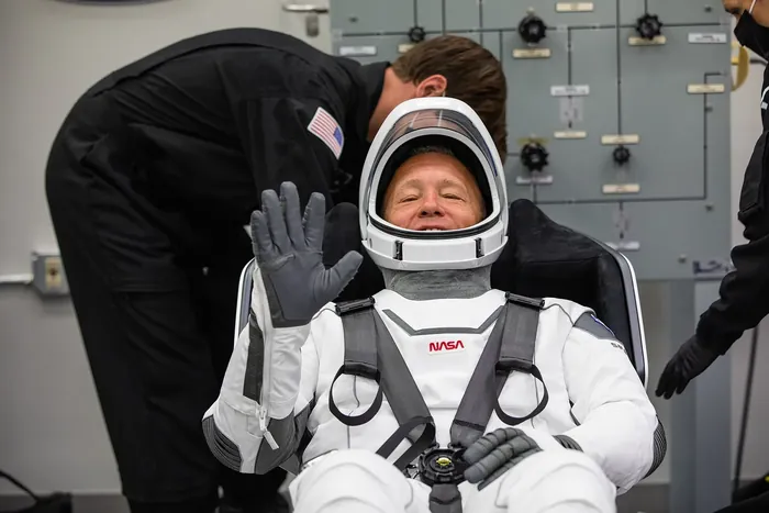 Douglas Hurley suiting up