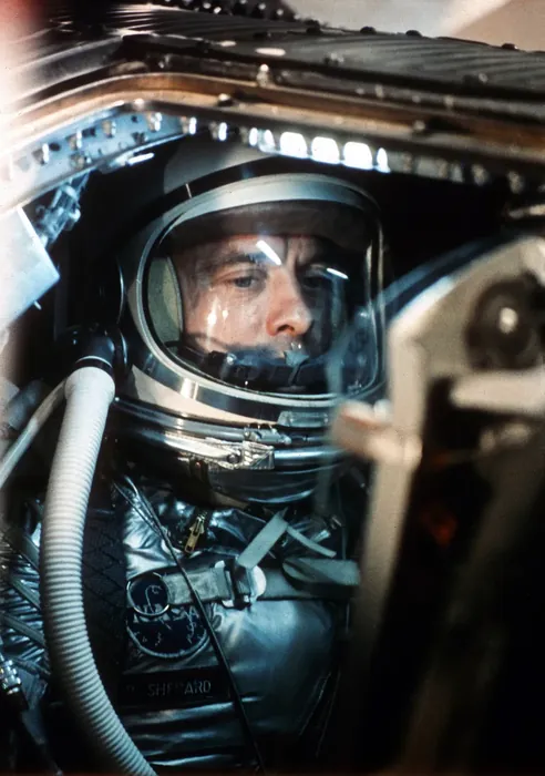 Astronaut Alan B. Shepard Jr. seen inside Freedom 7 spacecraft awaiting launch.