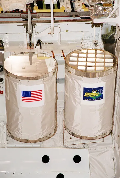 Getaway Special canisters in Atlantis' payload bay for