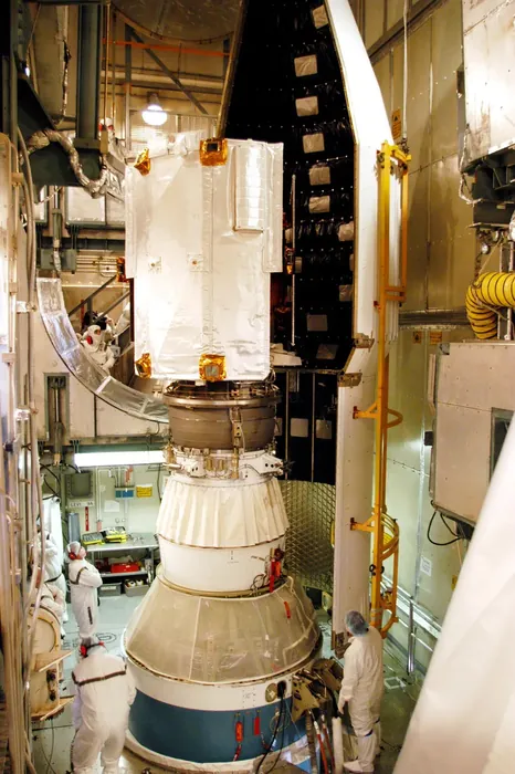Delta II H fairing installation around MESSENGER spacecraft