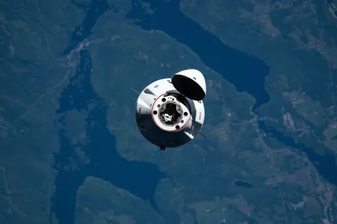 iss065e327741 (Aug. 30, 2021) --- The SpaceX Cargo Dragon vehicle approaches the International Space Station for an autonomous docking to the Harmony…