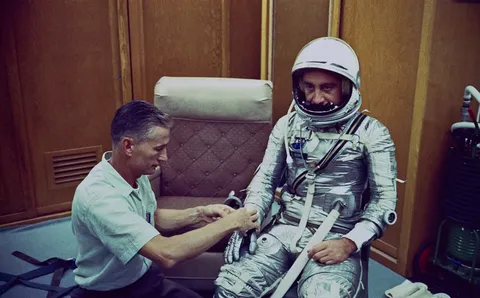Astronaut Grissom dons spacesuit for Mercury Redstone 4 mission