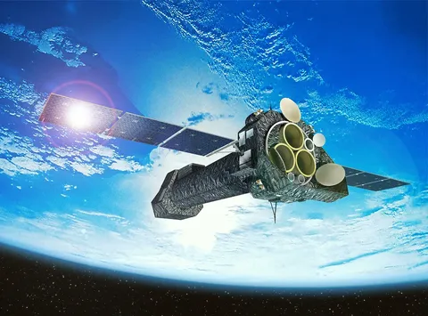 An artistic rendering of the XMM-Newton (X-ray Multi-Mirror Mission) space telescope against Earth in the background.