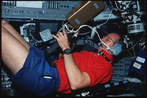 S45 04 024 Pilot Brian Duffy uses the SAREX equipment DPLA f004e26f9ce9a0522f229dd3674b39ef