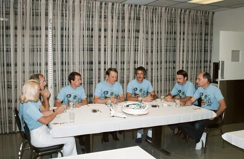 STS-51-D crew preflight breakfast on launch day.