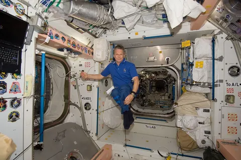 S132E010067 Sellers floats in the Node 1 during Joint Operations DPLA 4869e9d1d3c4070cd5319e514c116251