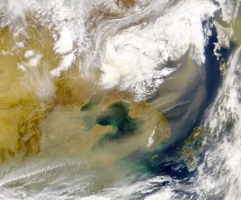 Satellite image of East Asia. Dust storm hits China, Korea Japan.
