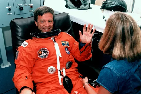 Payload Specialist Robert Brent Thirsk, CSA Astronaut, suits up prior to the STS-78 mission in June 1996.