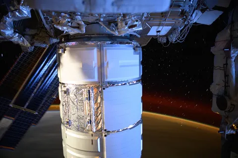 Cygnus space freighter berthed to the Earth facing port on the Unity module