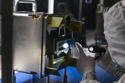 An engineer inspects NEO Surveyor’s Infrared Detectors