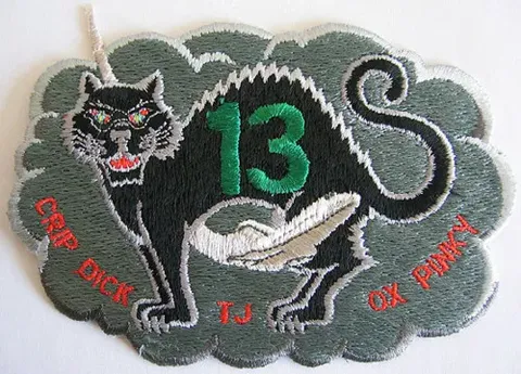 This is an alternate patch design created by the Astronauts, making a joke on the Friday the 13th landing.