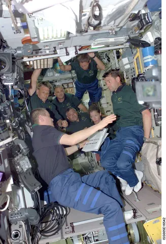 crewmembers in the Zvezda Service Module