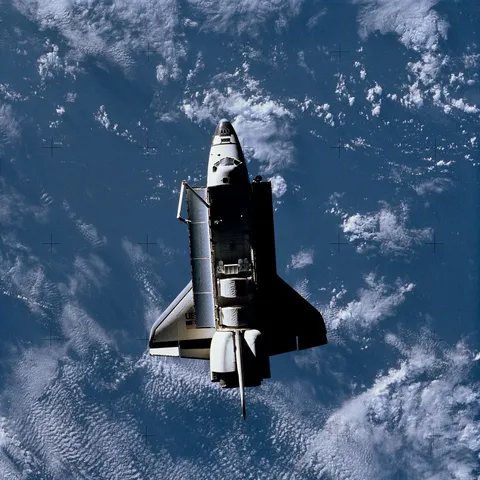 Full views of "Challenger" in Space, taken by the Shuttle Pallet Satellite (SPAS), also views of Cargo Bay and Remote Manipulator System (RMS)…