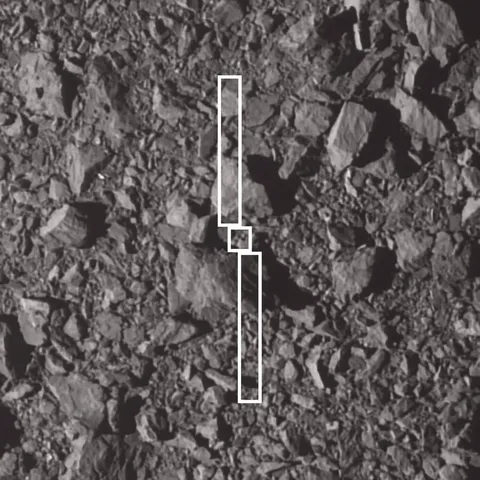 Footprint of DART spacecraft over the spot where it impacted asteroid Dimorphos. The largest boulder near the impact site is about 6.5 meters (21…