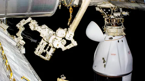 The SpaceX Dragon CRS 26 cargo craft is docked to the space station