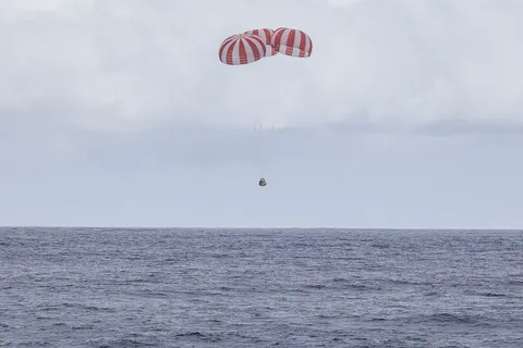 CRS 4 Dragon under parachute