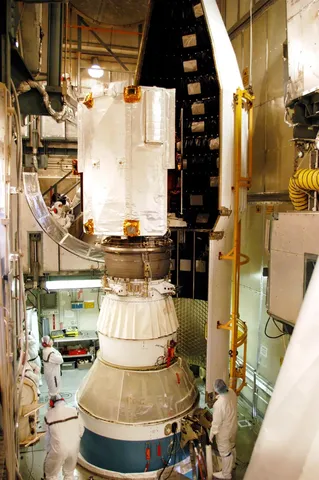 Delta II H fairing installation around MESSENGER spacecraft