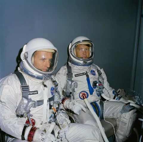 Gemini 6A astronauts ride the special van from the LC 16 suiting trailer to LC 19 at Cape Kennedy