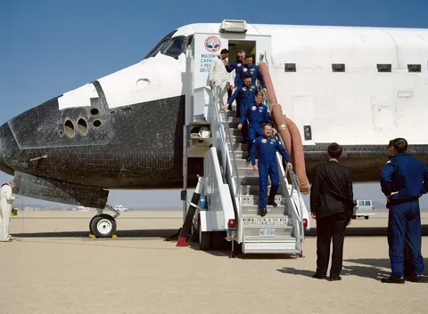 STS 36 Crew Egress