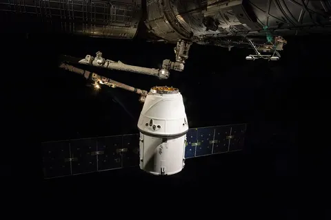 The CRS-6 Dragon spacecraft is moved towards its berth on the Harmony node of the International Space Station.